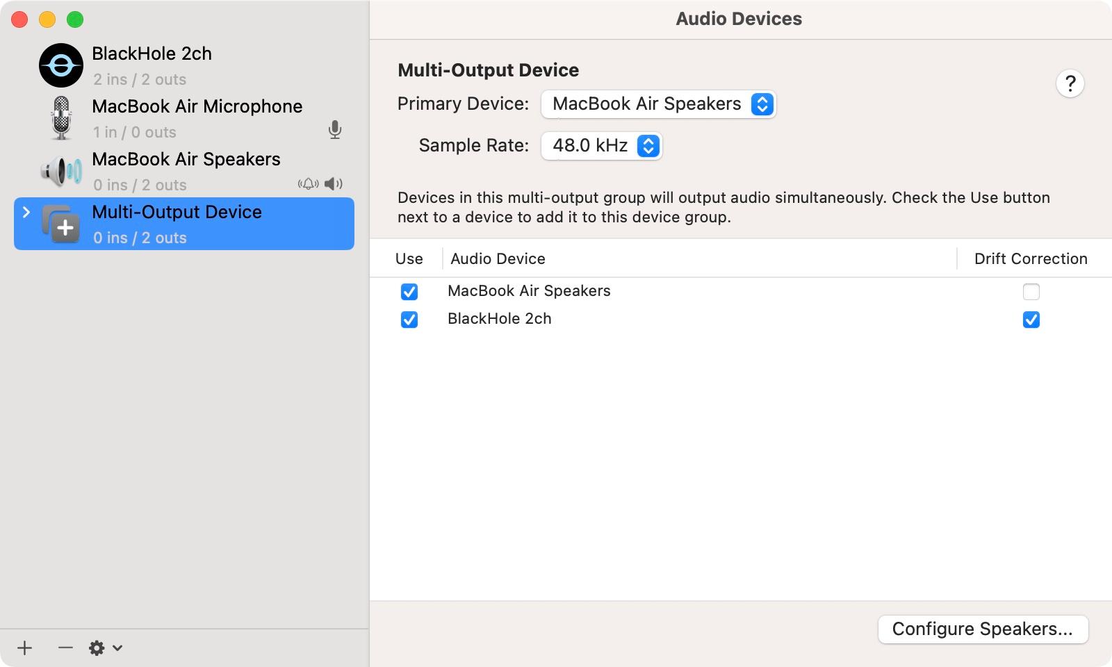 Audio MIDI Setup on macOS: a Multi-Output Device using MacBook Air Speakers and BlackHole 2ch, with Drift Correction ticked for BlackHole 2ch only